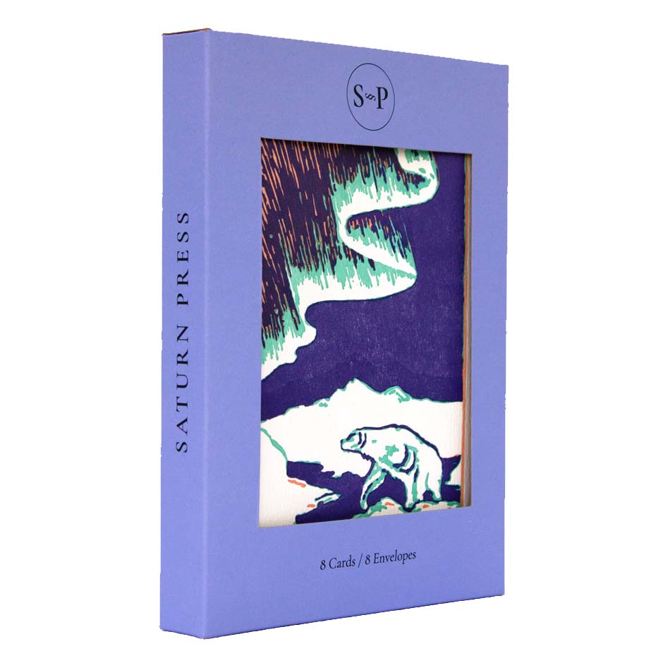 Framed artwork of a bear in a snowy landscape with purple and teal colors.