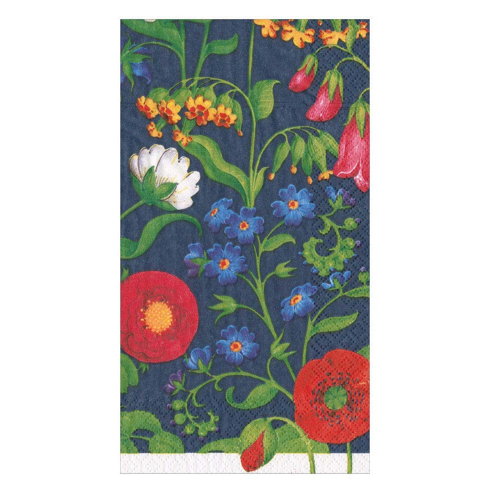 A folded guest towel napkin with a floral pattern featuring red, blue, and green colors.
