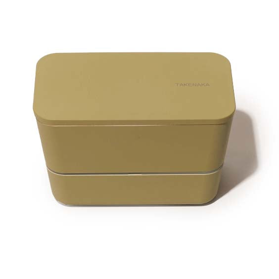 Green lunch box with 'TAKENAKA' branding on a white background