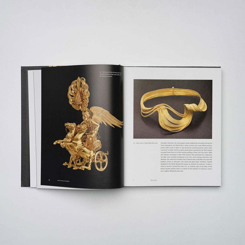 Book cover of 'Brilliance: Jewelry Art and Fashion' with gold jewelry design on a black background