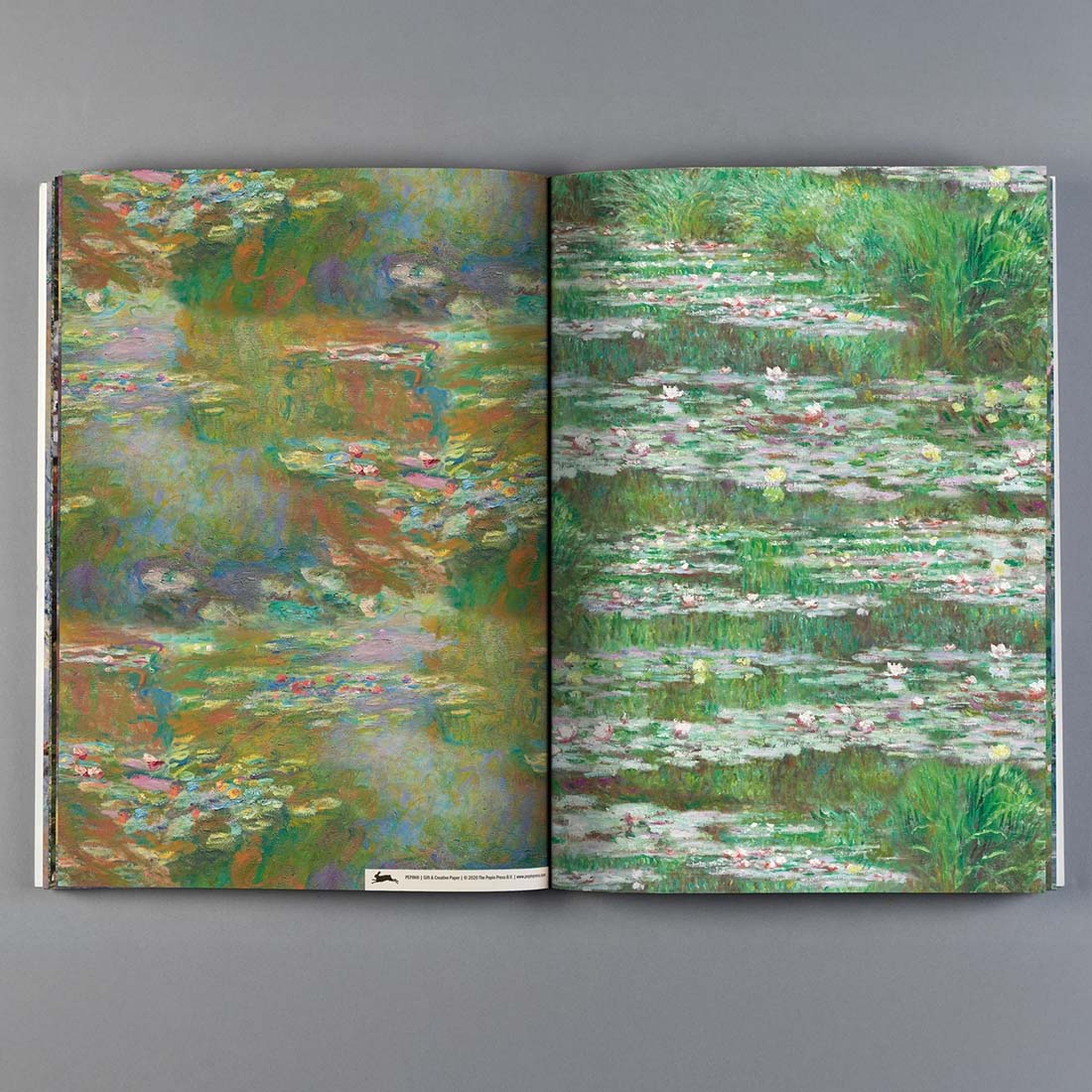 Gift paper with Claude Monet's 'Water Lilies' painting design on a white background.
