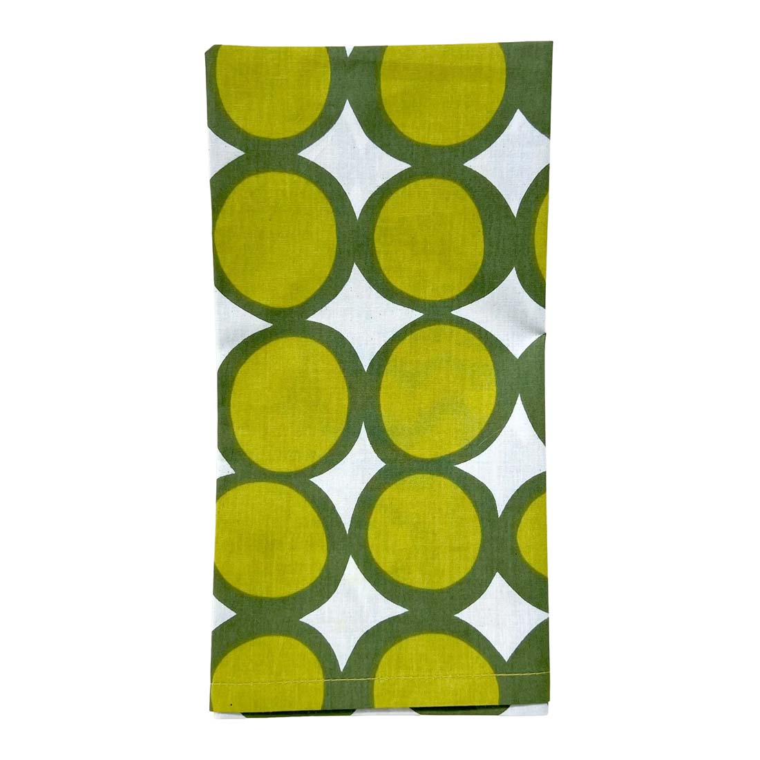 Folded fabric with green and white circular pattern on a white background