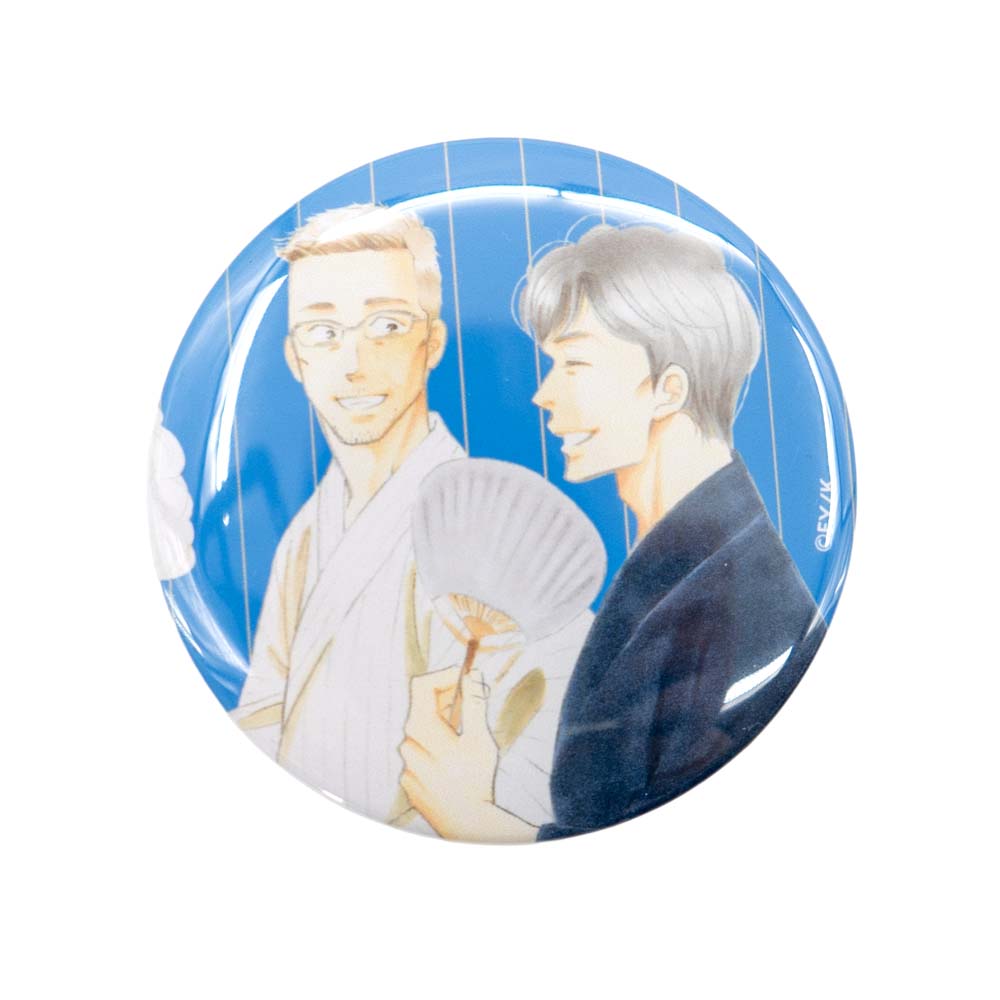 Round product with anime-style illustration of two characters on a blue background