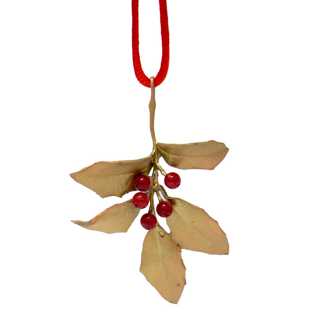 Mistletoe decoration with red berries on a white background