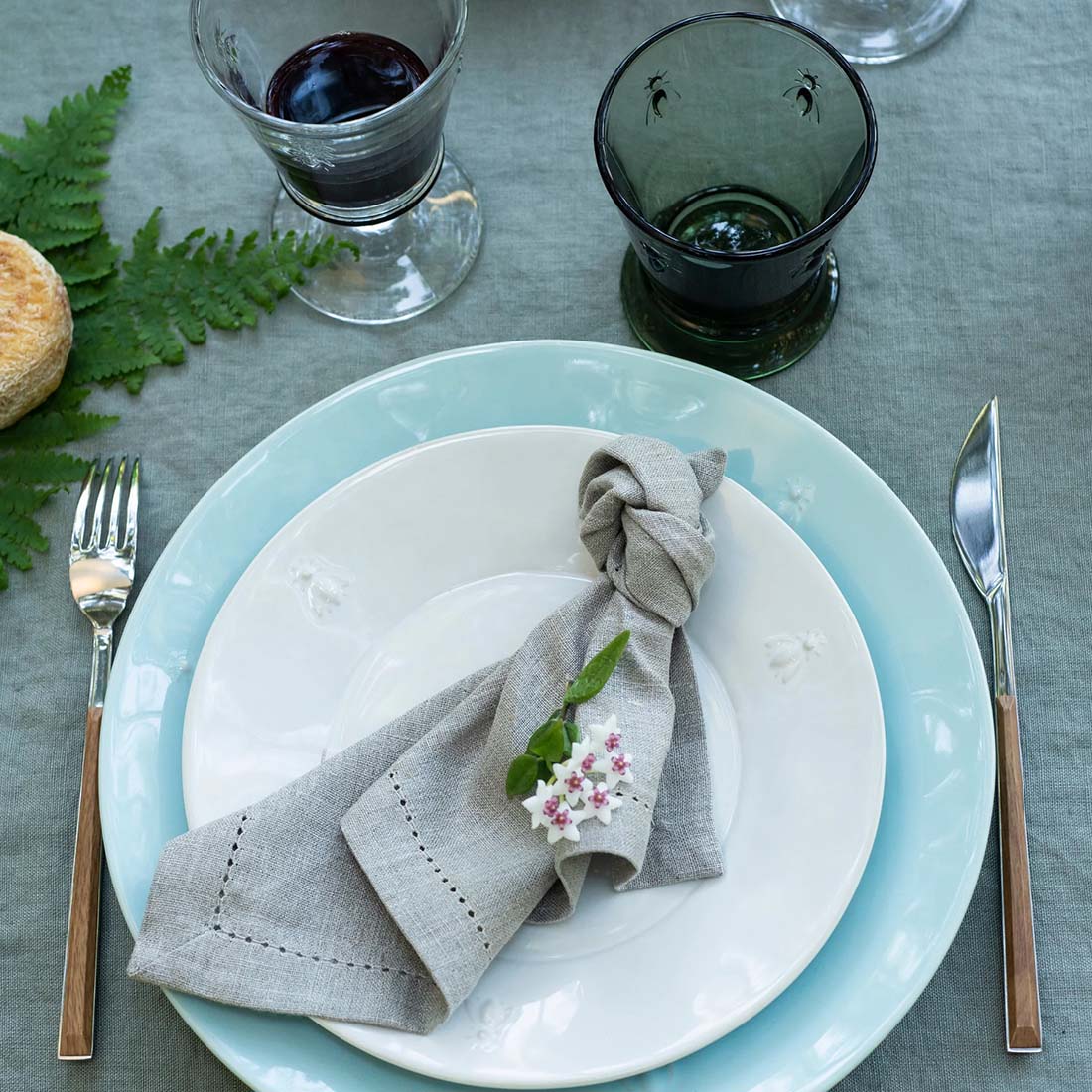 Light blue ceramic plate on a white background