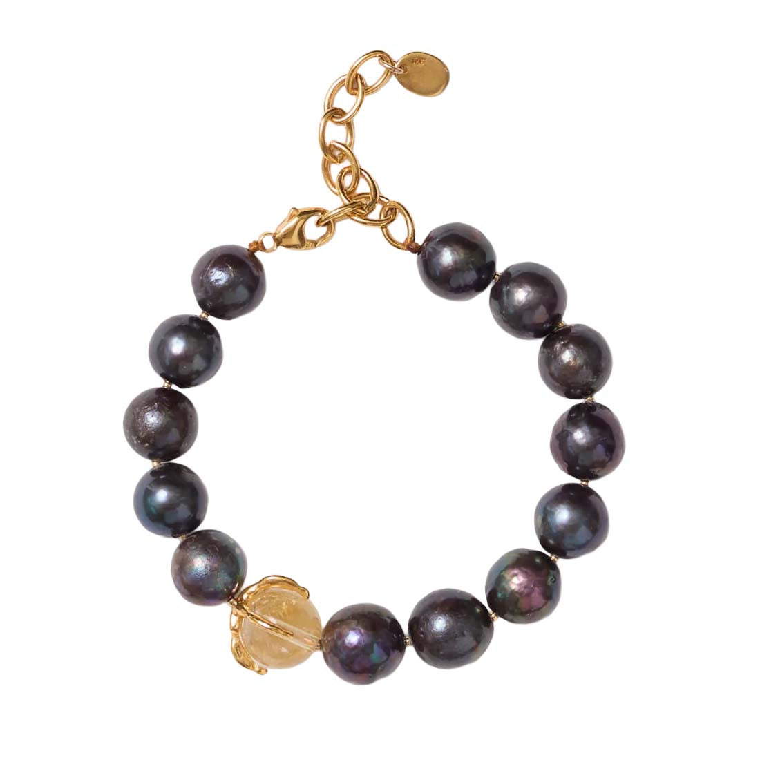 Pearl bracelet with gold clasp on a white background