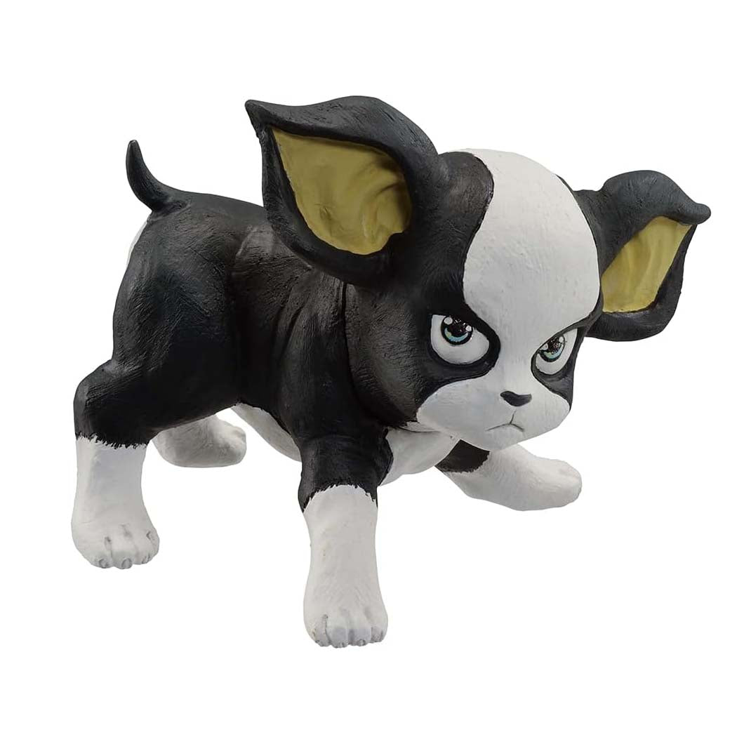 Black and white dog figurine with large ears on a white background