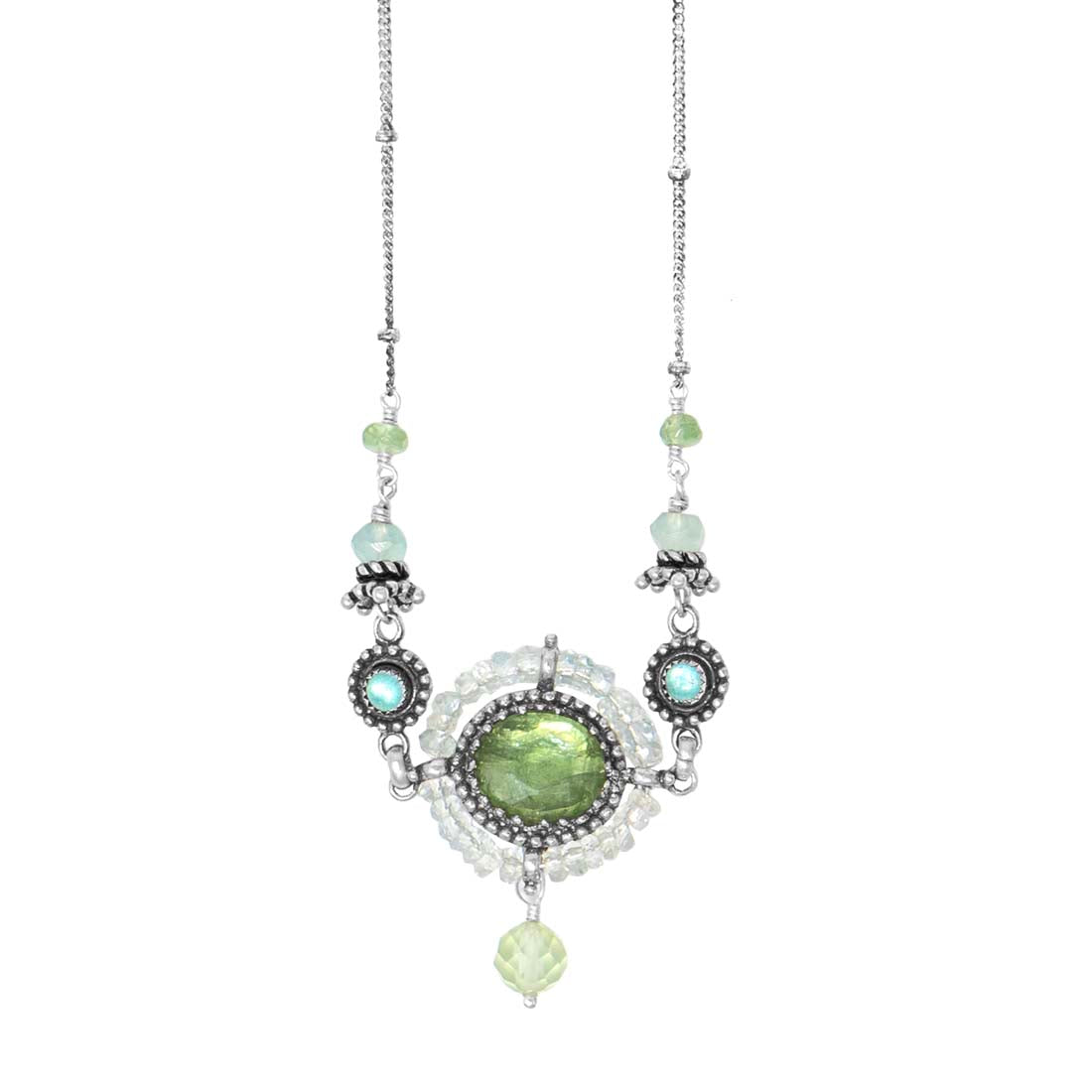 Necklace with green gemstone and silver chain on a white background
