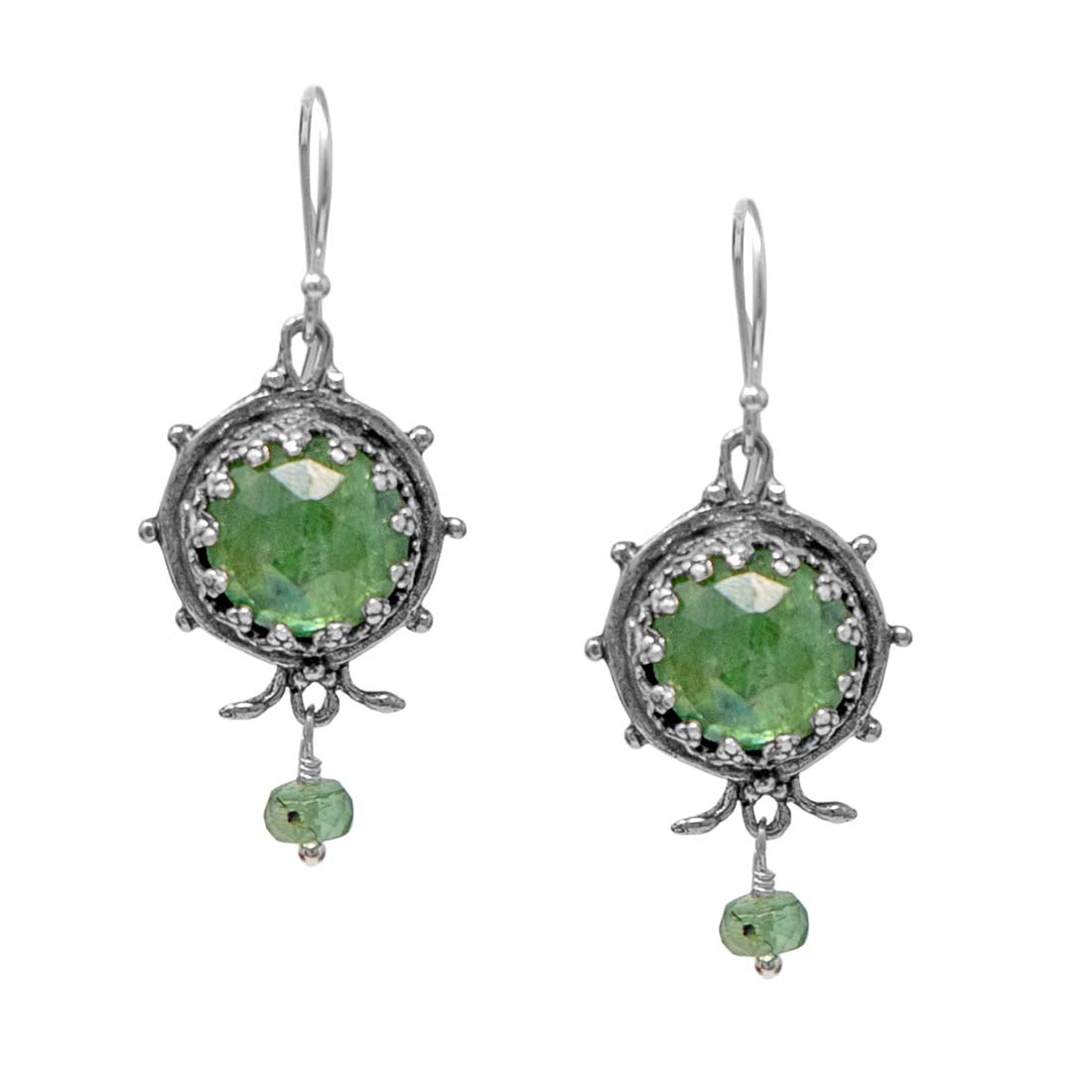 Pair of silver earrings with green gemstones on a white background