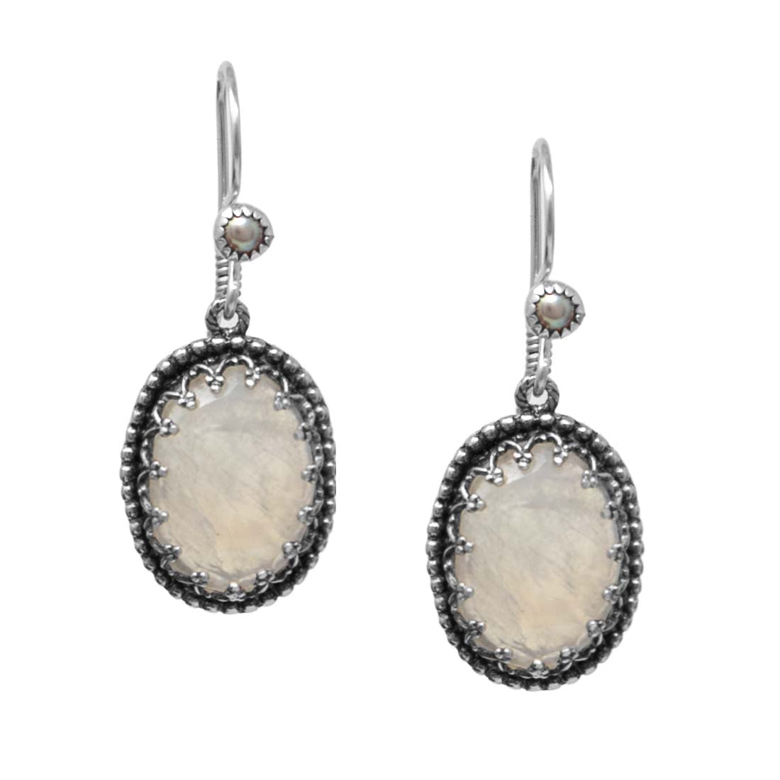 Pair of silver earrings with oval stone on a white background