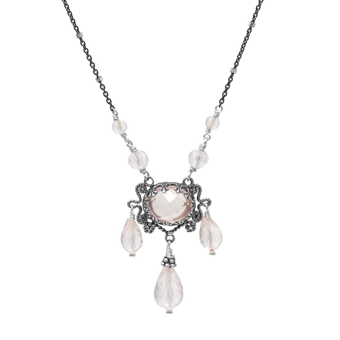 Necklace with a central pendant and teardrop-shaped beads on a white background