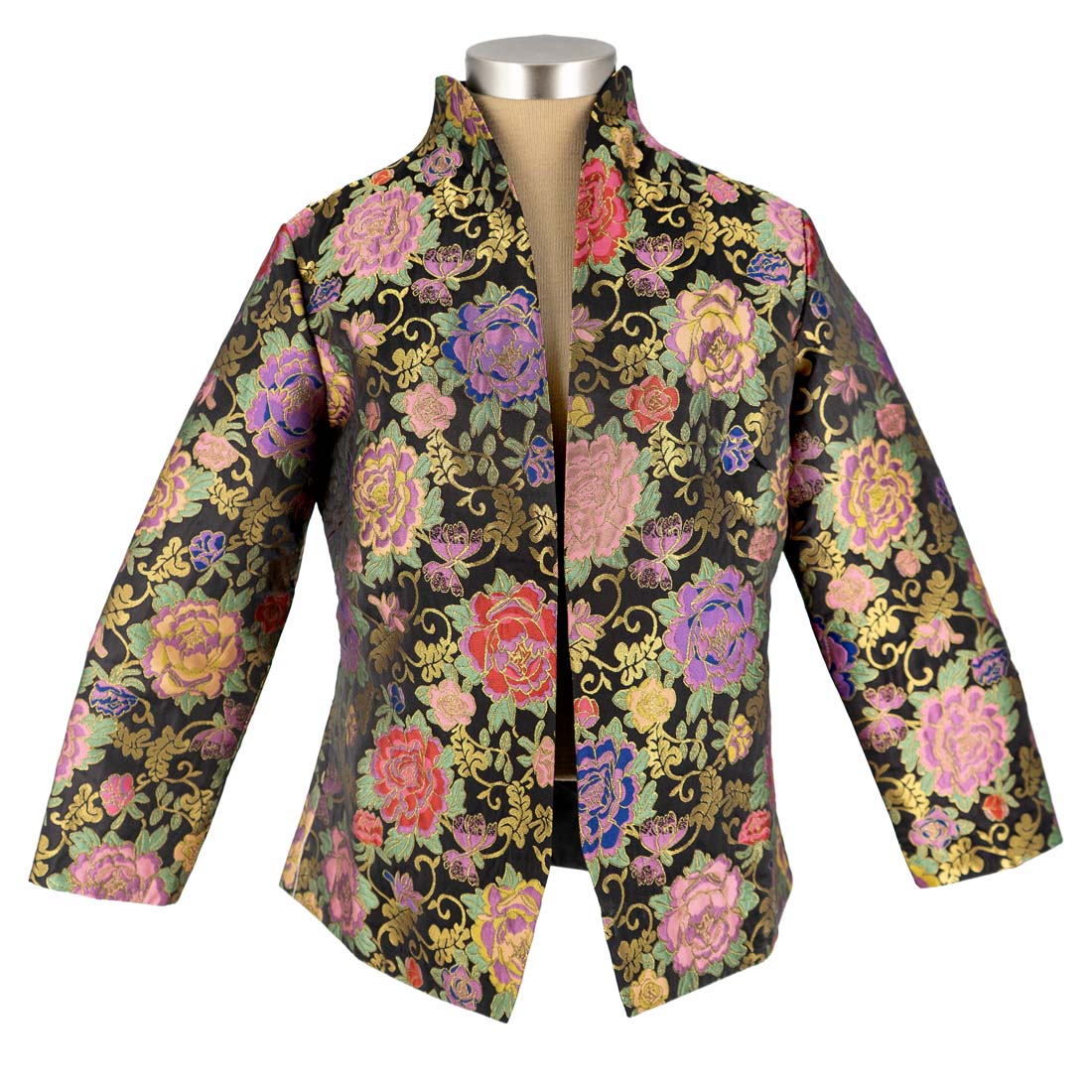 Floral patterned jacket on a mannequin against a white background