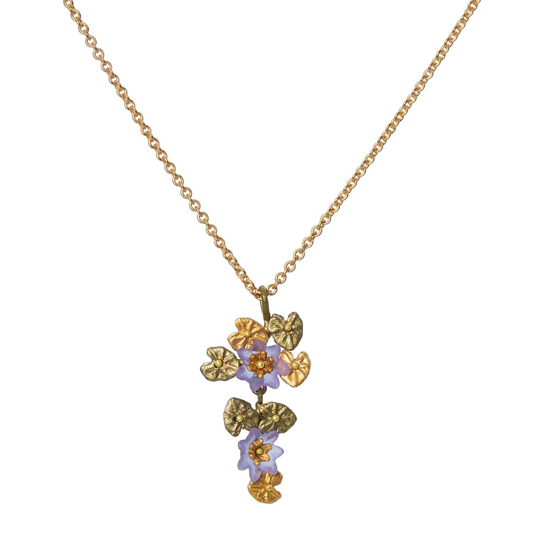 Gold necklace with floral pendant on a white background