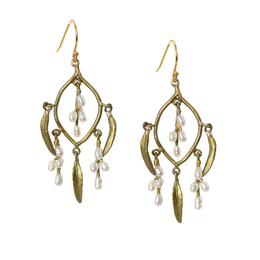 Gold earrings with pearl drops on a white background