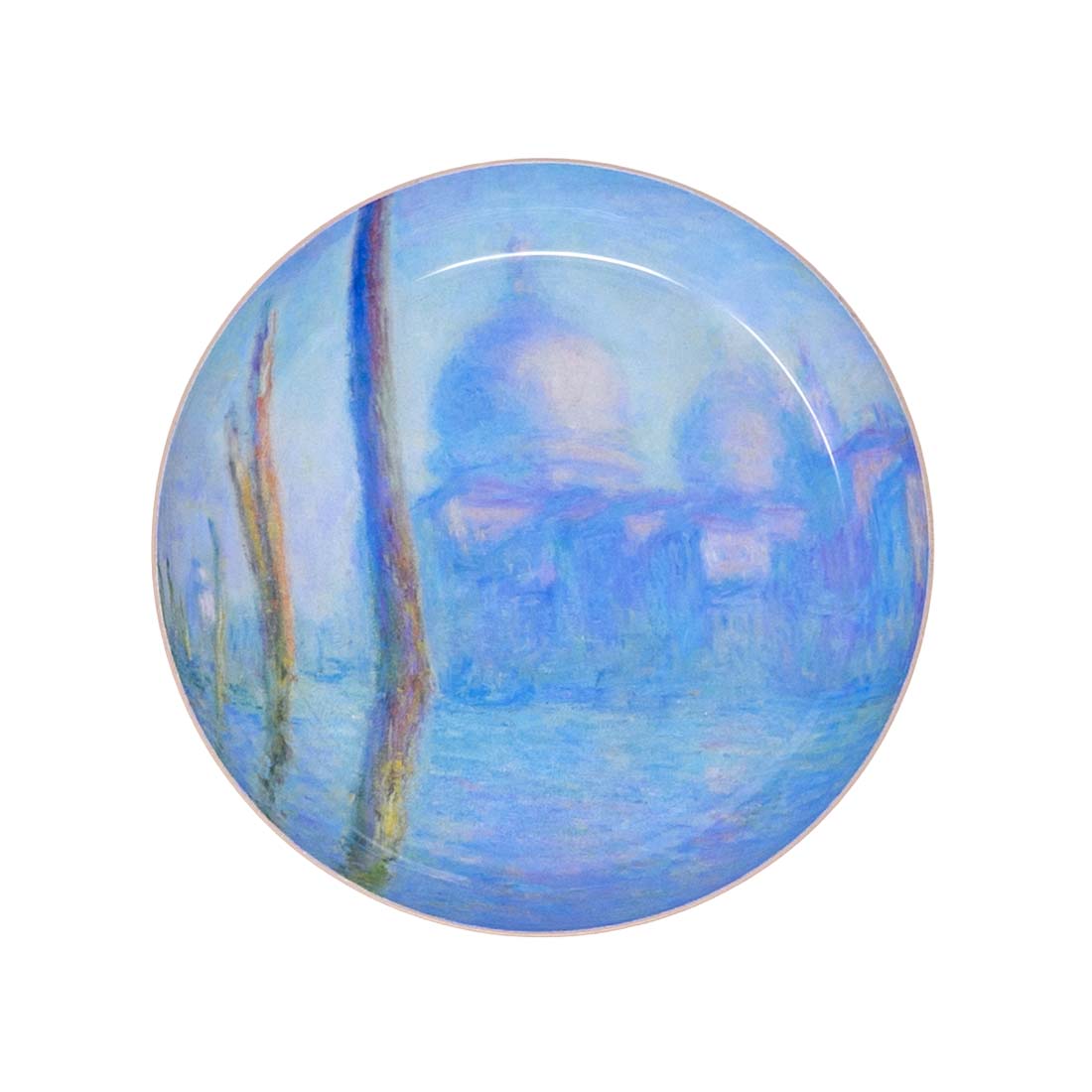 Round blue and white ceramic plate with a scenic design on a white background