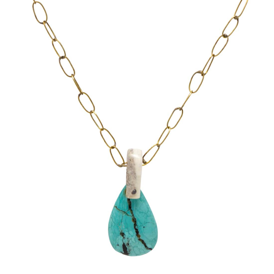 Necklace with a turquoise teardrop pendant on a gold chain against a white background