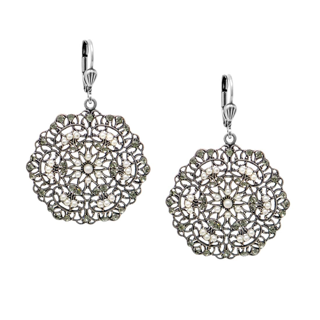 Pair of silver floral earrings on a white background