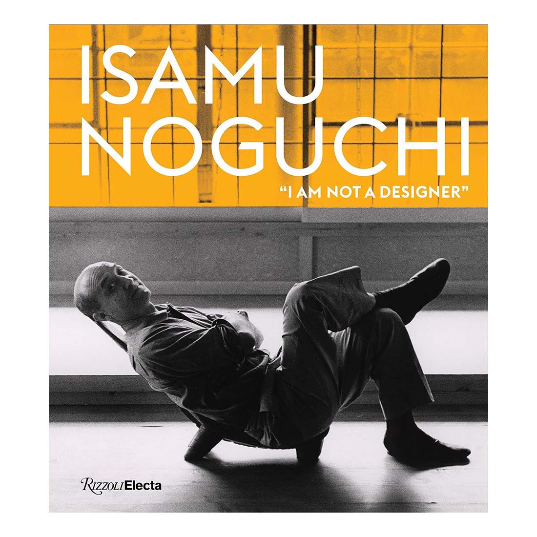 Book cover featuring a black and white photo of Isamu Noguchi lying on the floor with a yellow background and text.