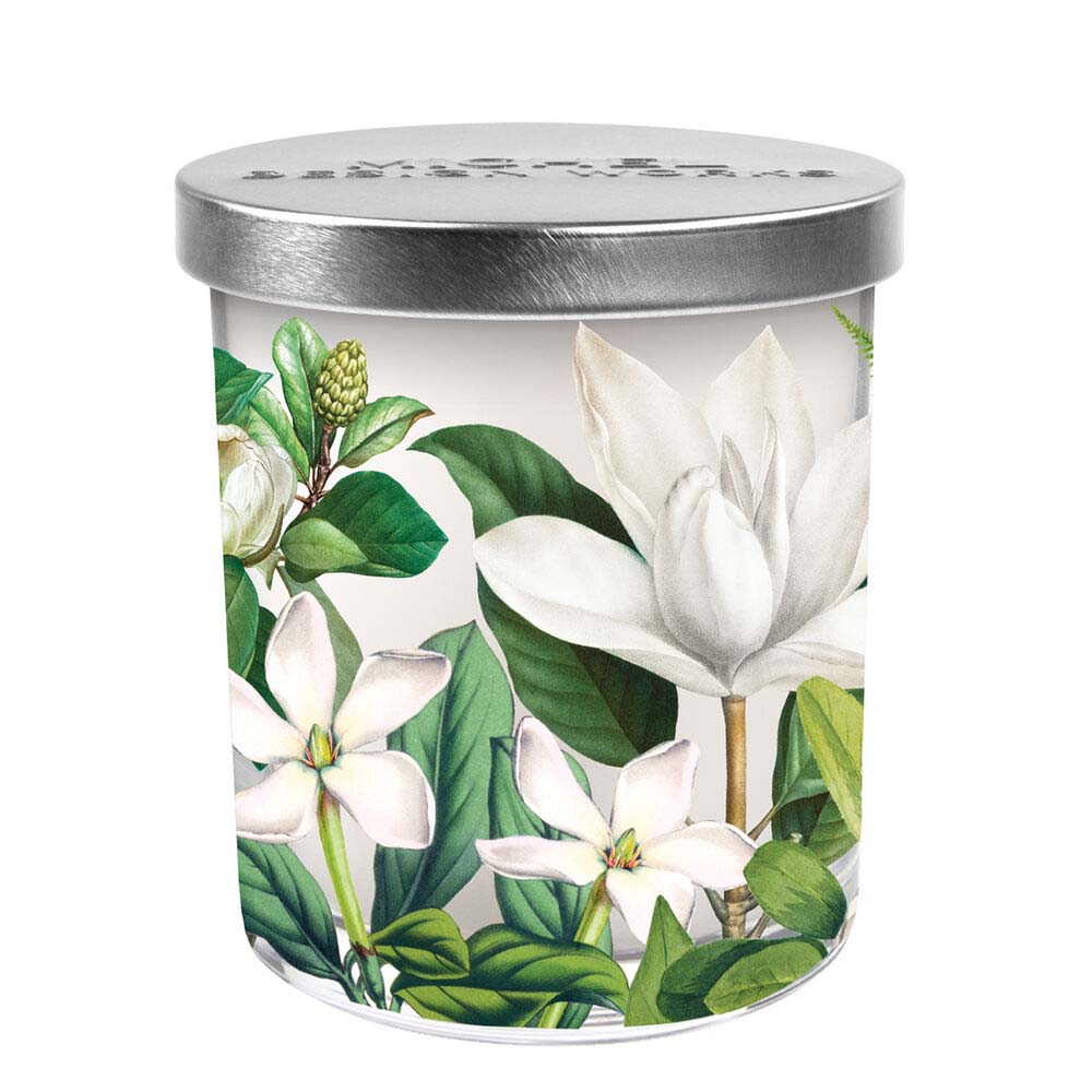 Candle jar with floral design and silver lid on a white background