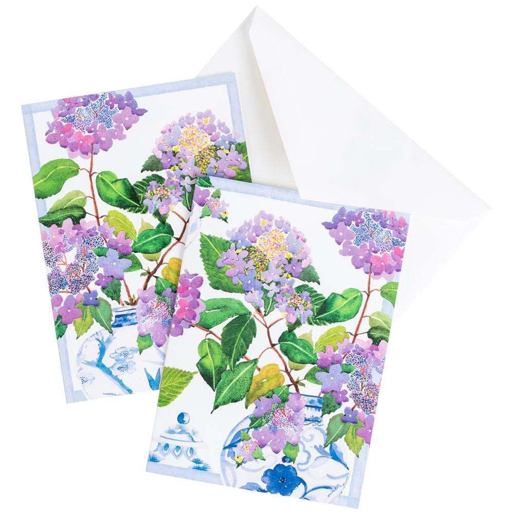 Two floral greeting cards with a white envelope on a white background