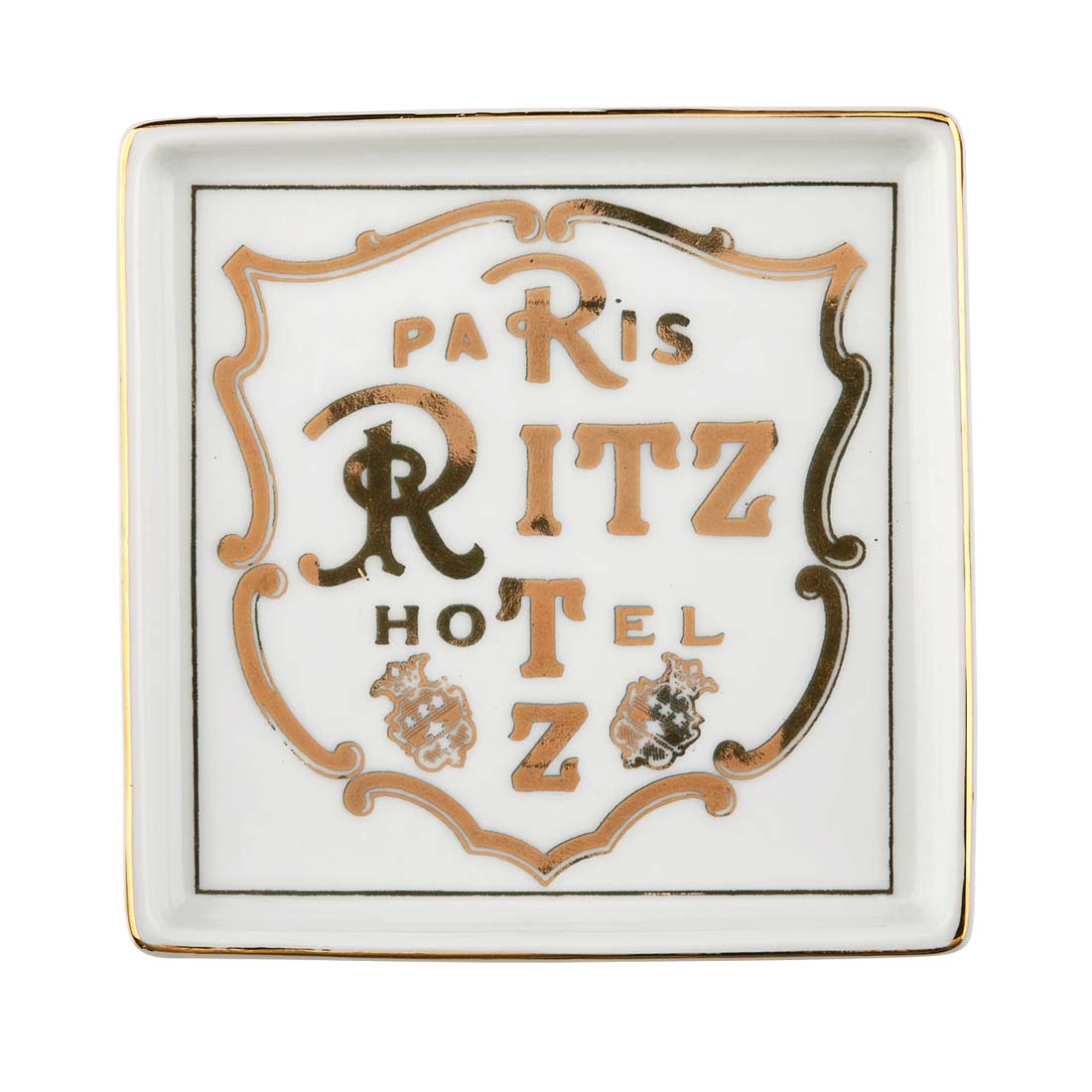 Decorative plate with 'Paris Ritz Hotel' text on a white background