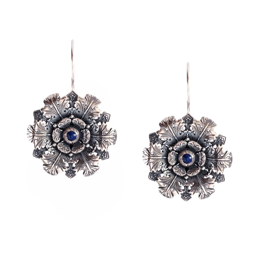 Pair of silver floral earrings with blue center gemstone