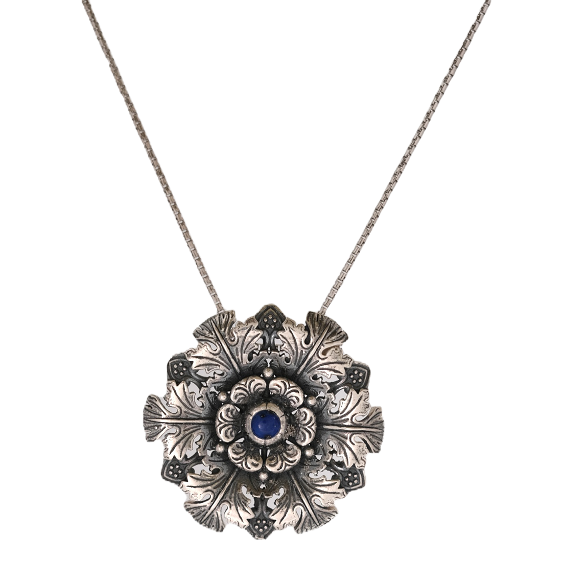 Floral silver pendant necklace with a blue center gemstone 