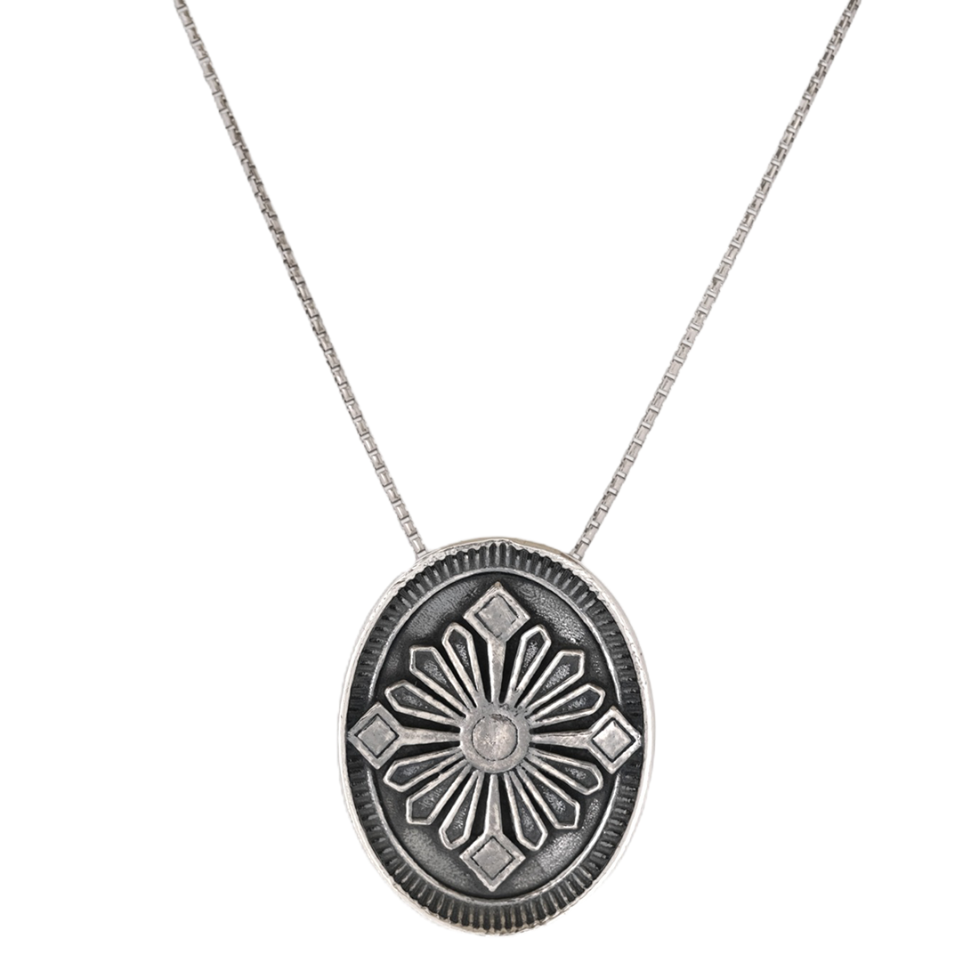 Silver oval pendant with floral design