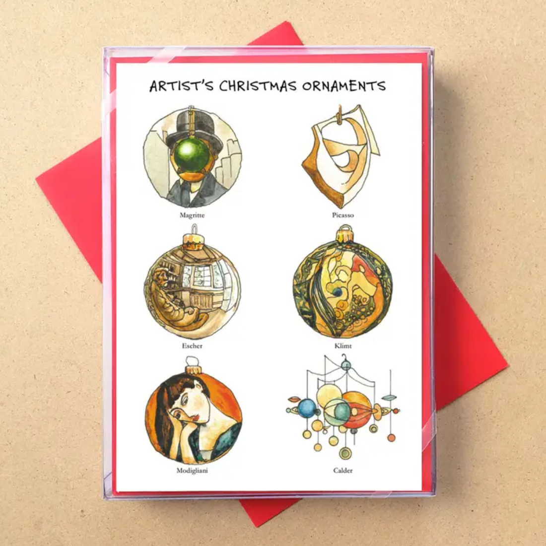 A white art print titled 'Artist's Christmas Ornaments' featuring six illustrated Christmas ornaments in a collage style, labeled with artist names: Magritte, Picasso, Duchamp, Kline, Modigliani, and Calder.