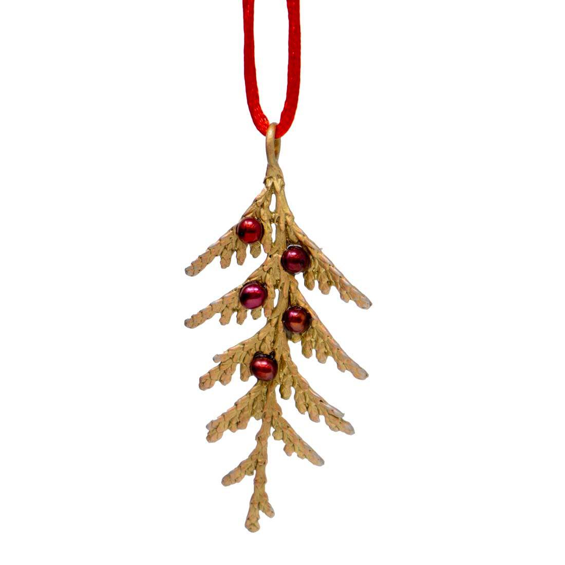 Decorative mistletoe ornament with red berries on a white background