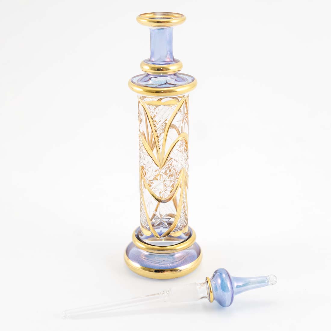 Decorative bottle with intricate design on a white background
