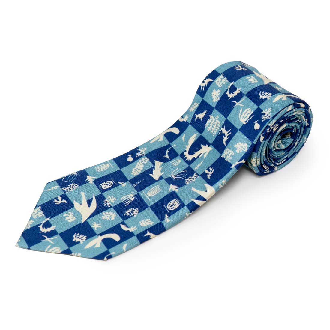 Roll of blue tie with white animal pattern on a white background