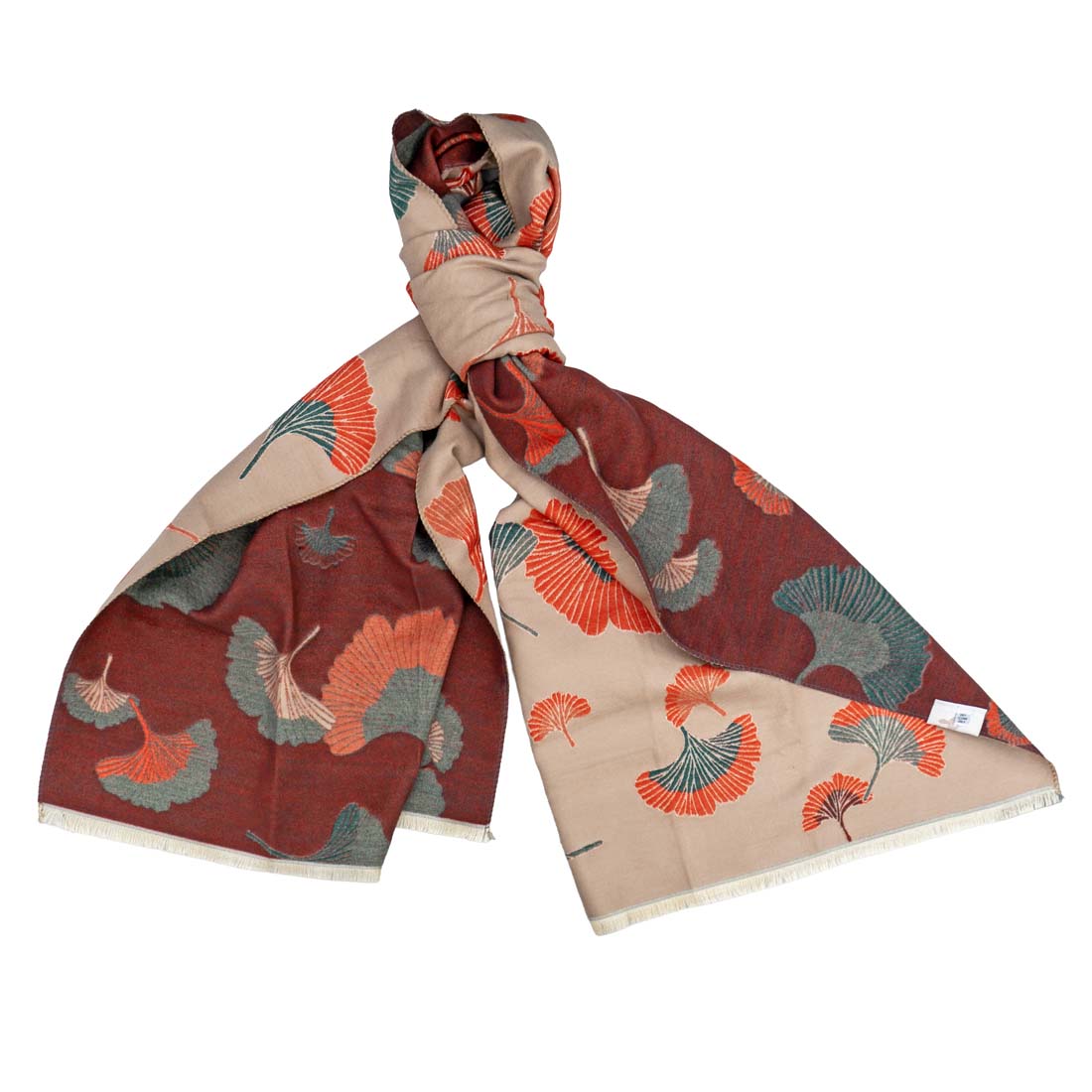 Beige and red patterned scarf on a white background