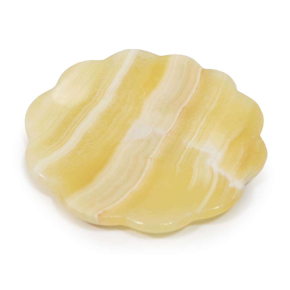 Yellow stone with white stripes on a white background