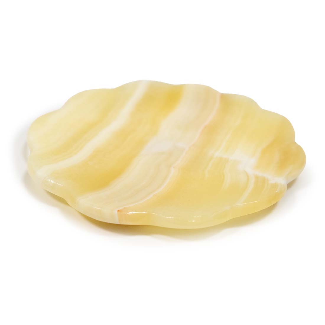 Yellow stone with white stripes on a white background