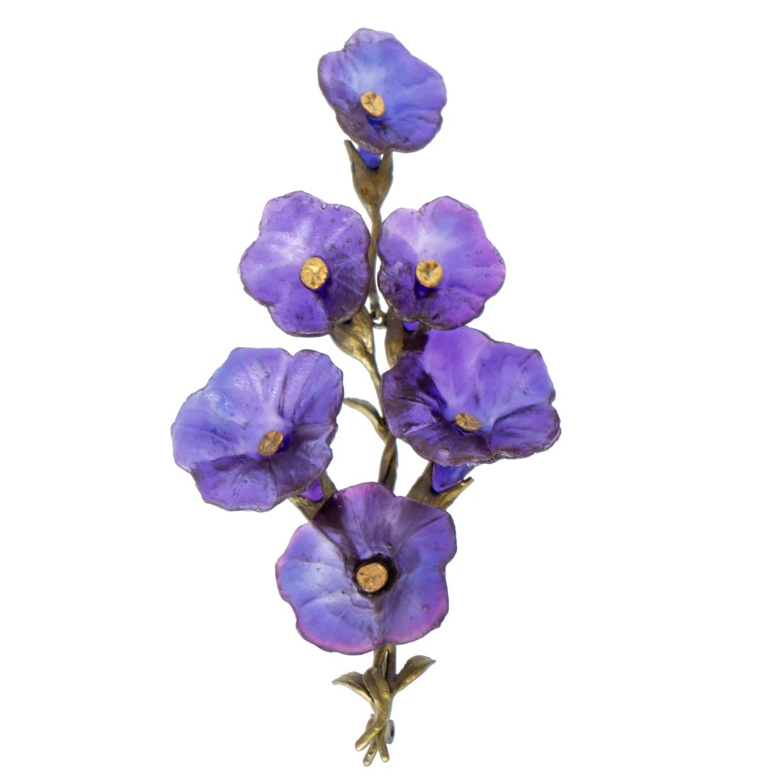 A brooch featuring a cluster of deep purple glass flowers with hand-patinated bronze leaves and twigs.