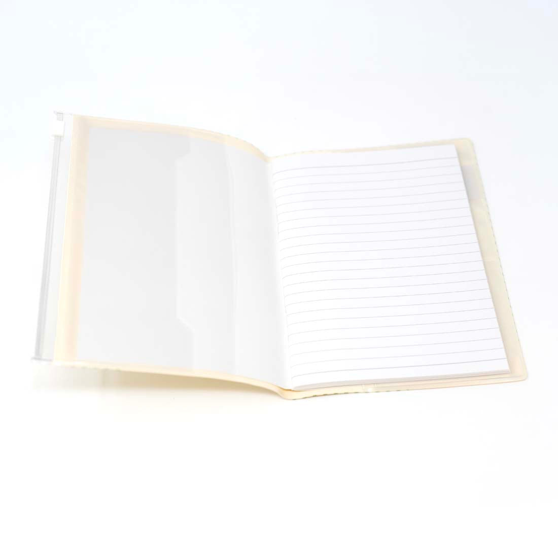 Notebook with a green frog illustration and 'BESHI da beshi' text on a beige background