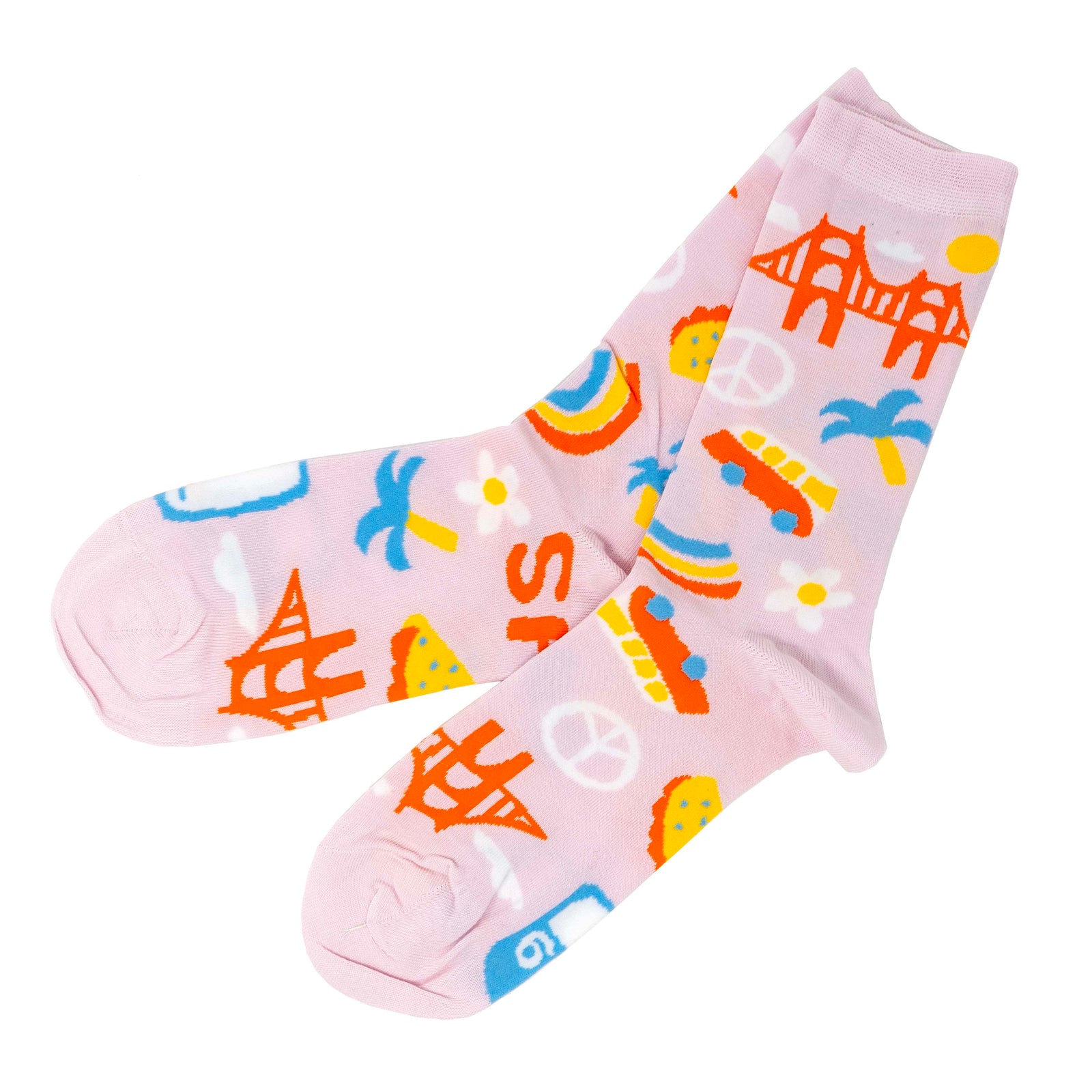 A pair of pink crew socks with geometric patterns and the text 'San Francisco'.