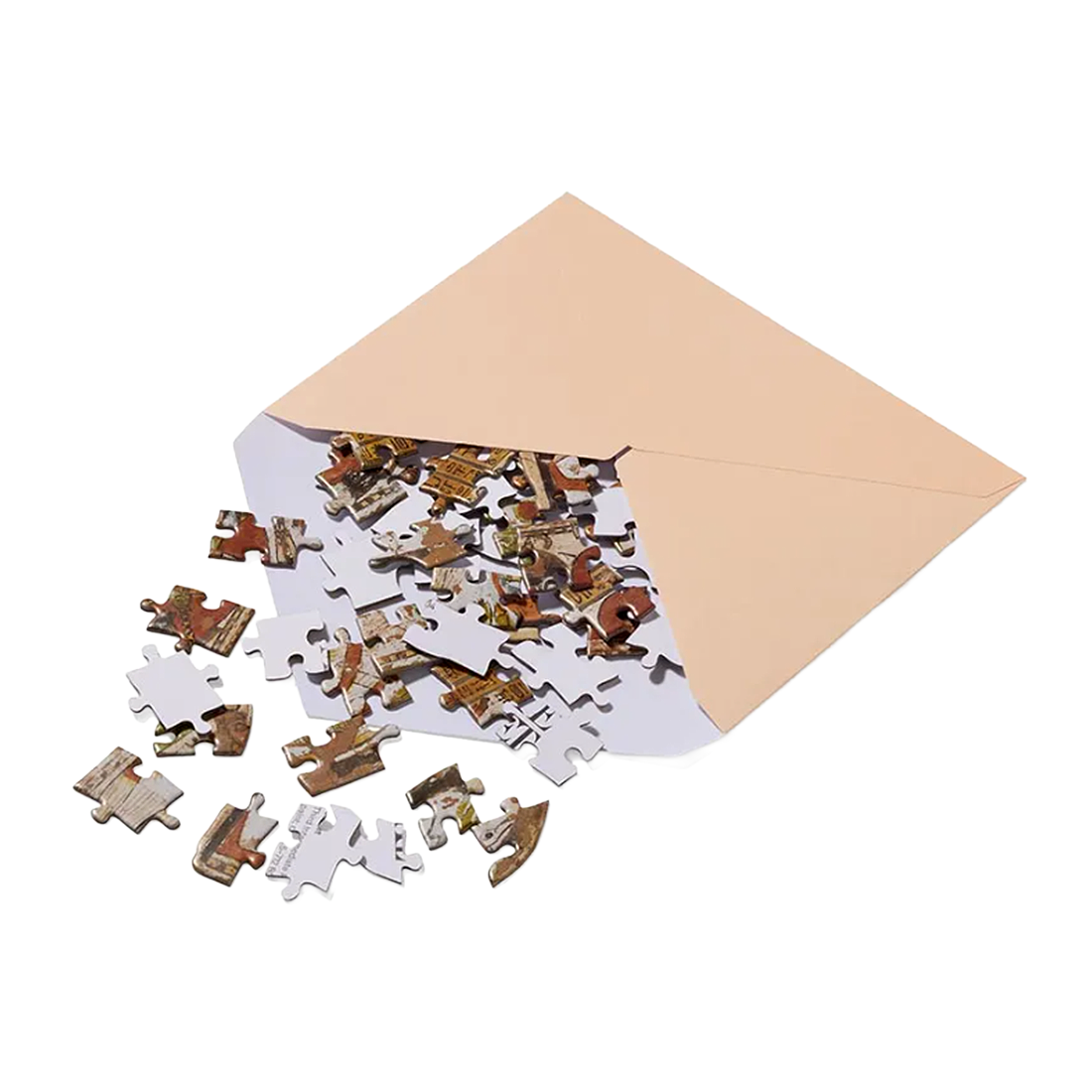 Puzzle pieces spilling out of a beige envelope 