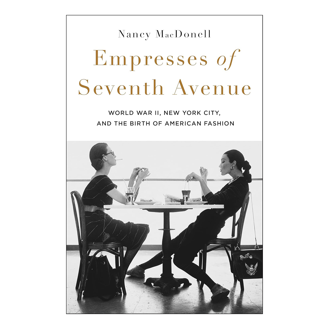 Book cover of 'Empresses of Seventh Avenue' by Nancy MacDonell featuring two women at a table.