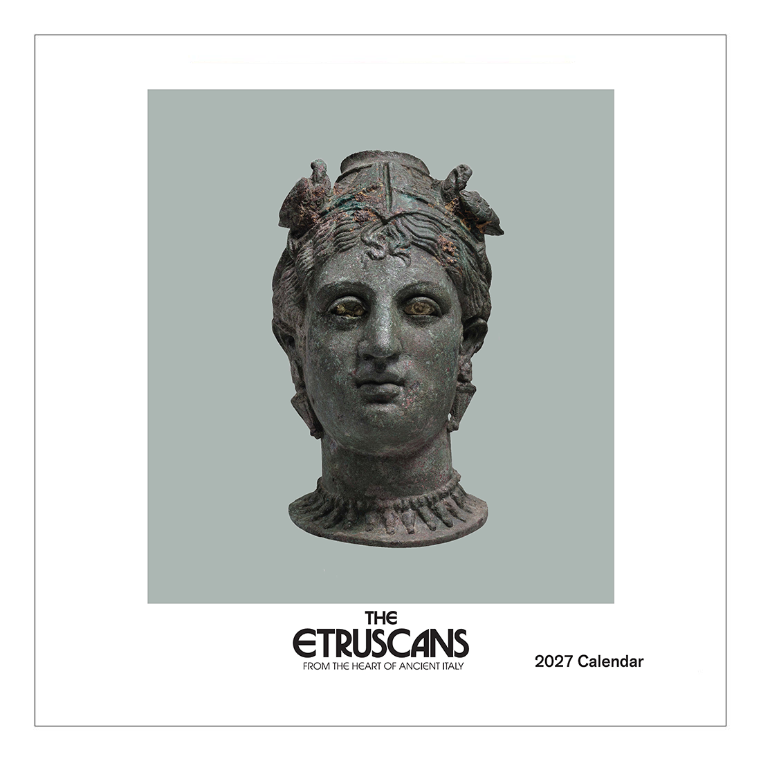 Calendar cover featuring an ancient statue head with 'The Etruscans' text on a gray background