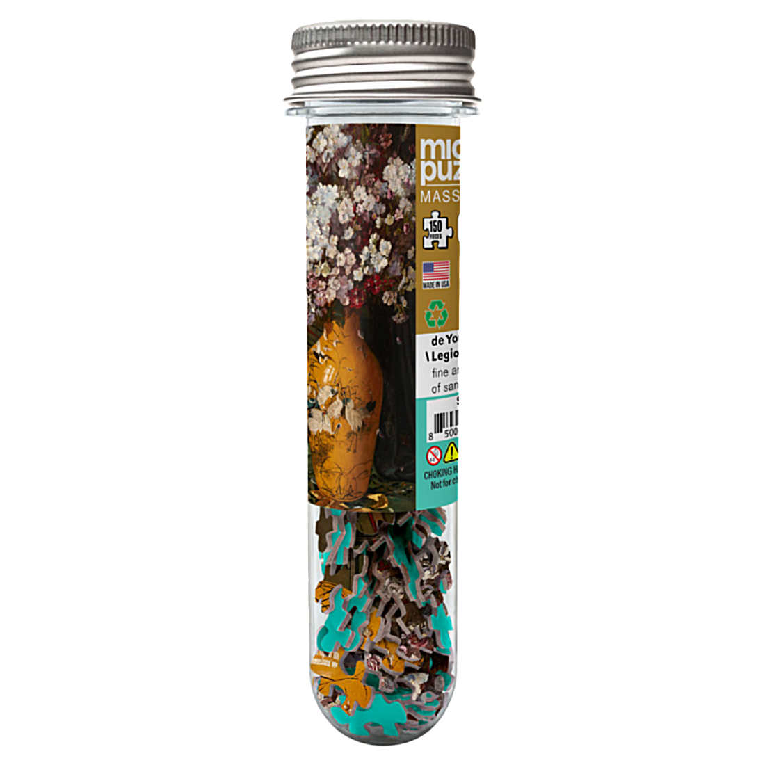 A clear cylindrical tube with a silver screw cap containing a colorful assortment of small jigsaw puzzle pieces. 