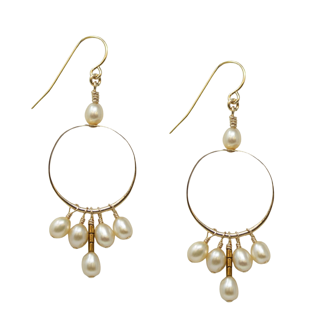 Gold hoop earrings with pearl drops on a white background