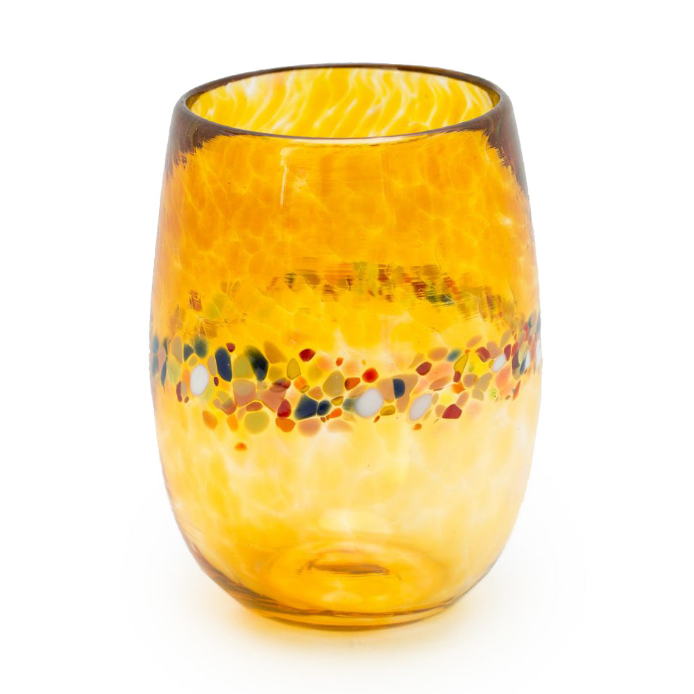 A handblown multicolored stemless wine glass with a unique spotted pattern