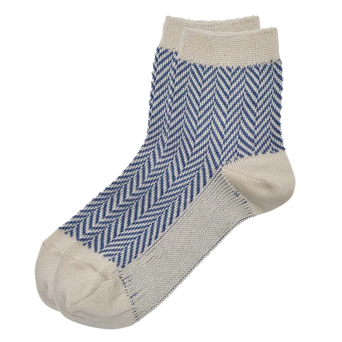 Pair of socks with blue and beige pattern on a white background