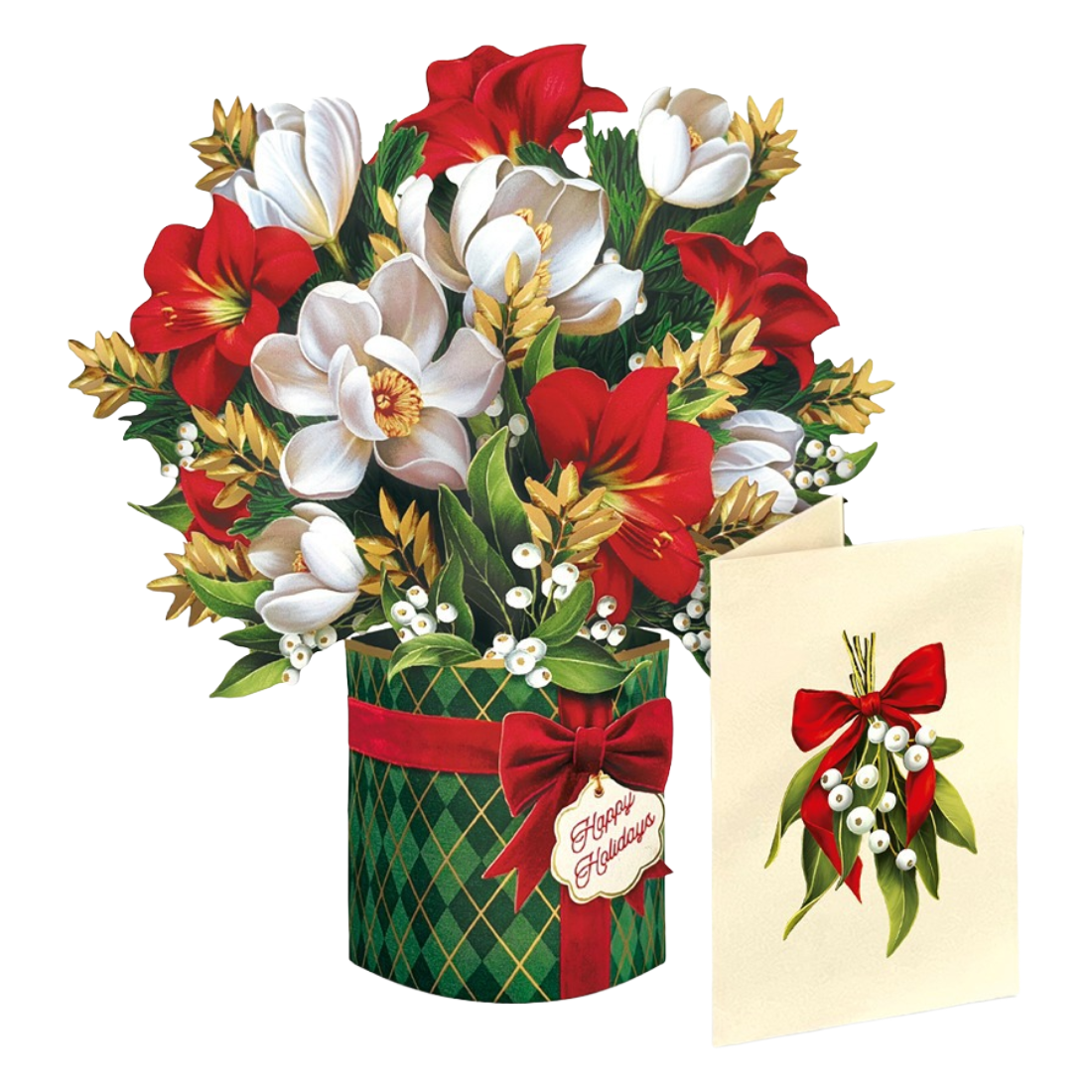 A festive holiday floral arrangement in a green plaid gift box with a red ribbon and bow, shown beside a cream greeting card featuring a matching red bow and floral design. The bouquet includes white magnolia flowers, red hydrangeas, green foliage, and small white berries on a white background.