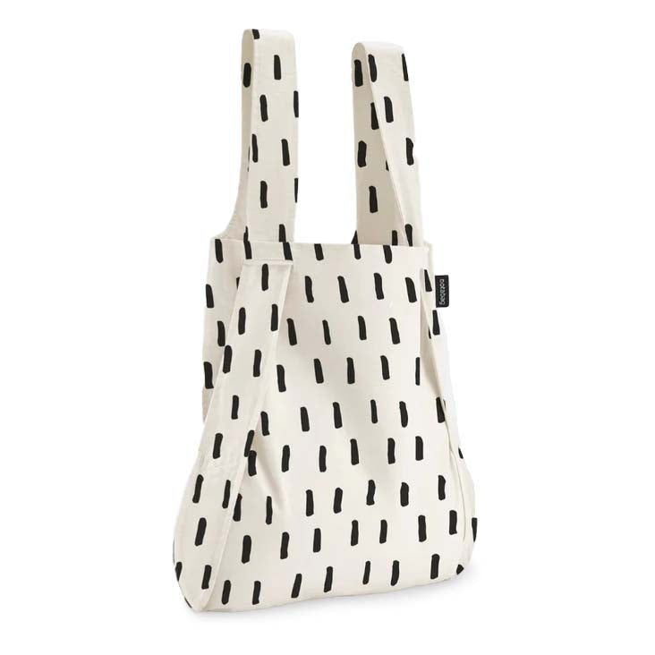 White tote bag with black abstract pattern on a white background