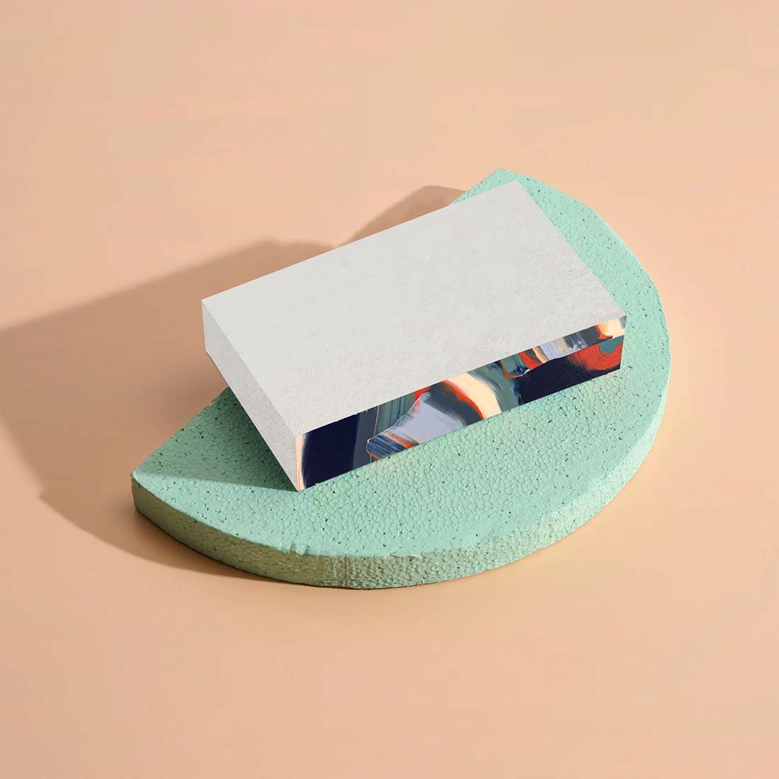 Rectangular box with a colorful abstract design on a white background