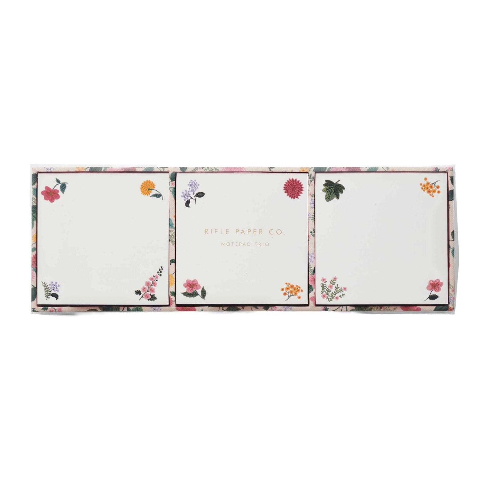 Set of three floral notepads with 'Little Paper Co.' branding on a white background