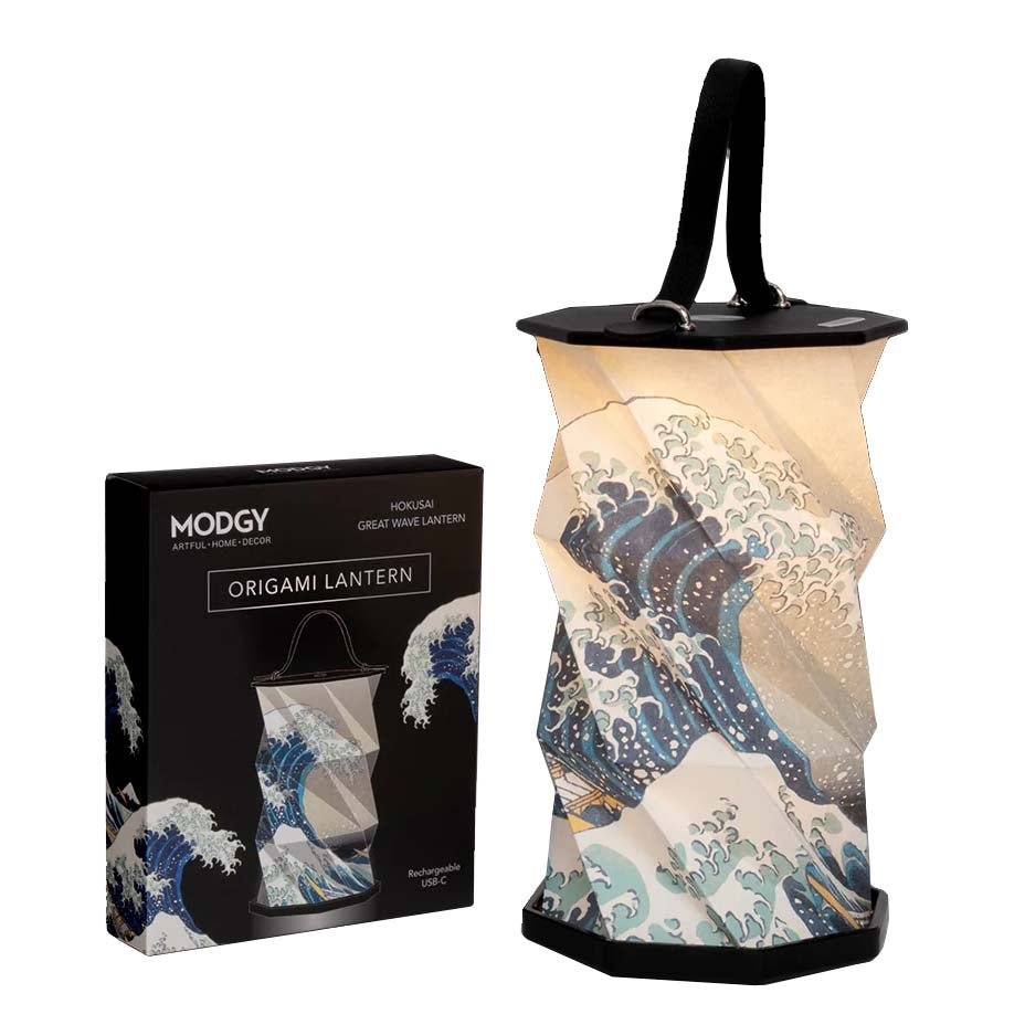 An Origami Lantern featuring Hokusai's 'Great Wave Off Kanagawa' woodblock print design, displayed next to its packaging.